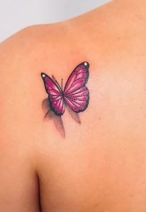 Pink monarch butterfly tattoos