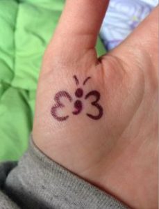 Tiny And Simple Semicolon butterfly Tattoo Idea