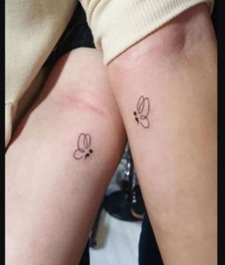 Tiny And Simple Semicolon butterfly Tattoos