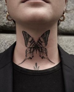 Black Butterfly Tattoo Behind Neck