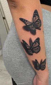 Black Butterfly Tattoo With Flower