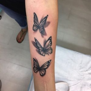 Black Butterfly Tattoo With Flower Designs