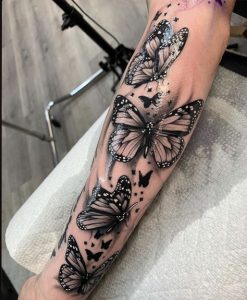 Black Butterfly Tattoo With Flower ideas