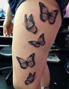 Black butterfly Tattoo on Thigh designs