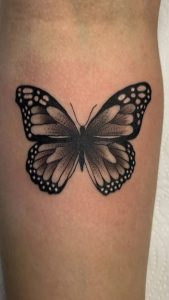 Solid Black Butterfly Tattoo