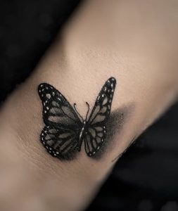 Solid Black Butterfly Tattoo ideas
