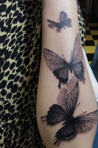 girl-black-butterfly-tattoos
