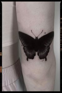 girls-black-butterfly-tattoo-design