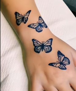 3d-butterfly-hand-tattoo