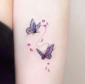 Beautiful-Minimal-Purple-Butterfly-Tattoo-deisgns