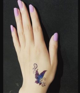 Purple Butterfly Tattoo On Wrist