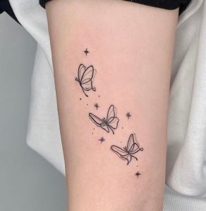 Realistic white butterfly tattoo