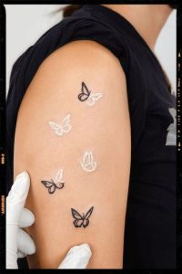 Realistic white butterfly tattoos