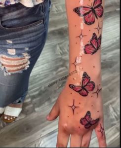 Red-butterfly-Hand-tattoo