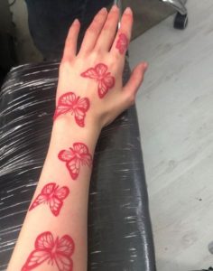 Red-butterfly-hand-tattoo-for-women