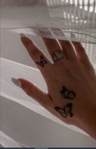 butterflies-hand-tattoo