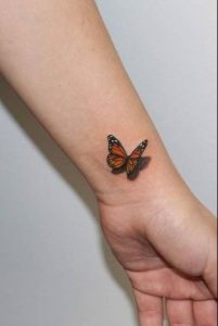 butterfly-hand-tattoo-women