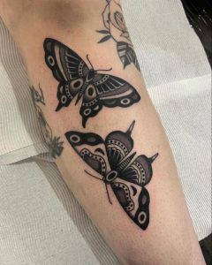 black american traditional butterfly tattoo