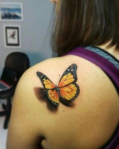 black-butterfly-tattoos-traditional-yellow