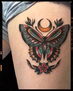 traditional butterfly woman tattoo