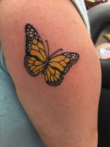 Yellow-butterfly-tattoo-on-foot