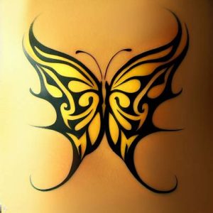 tribal yellow butterfly tattoo for girls