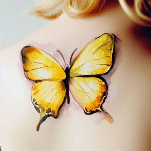 watercolor yellow butterfly tattoo designs for girls