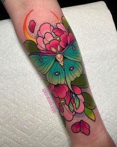 green and red luna moth tattoo