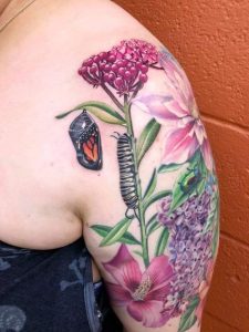 Caterpillar-tattoo-With-Flower-for-hand