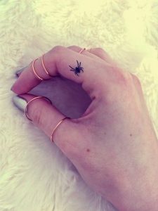 Small-spider-tattoo-on-finger