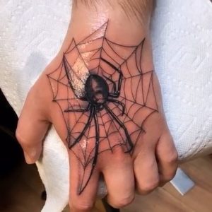 spider-tattoo-for-hand-on-white-skin