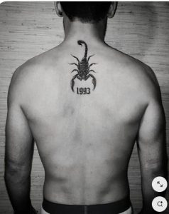 Minimalist scorpion tattoos