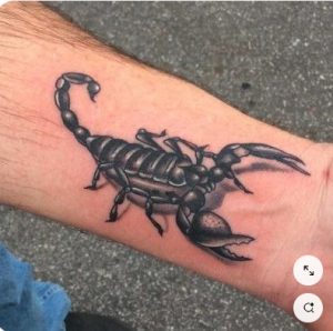 scorpion tattoo on wrist