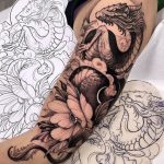 black-half-arm-sleeve-tattoo