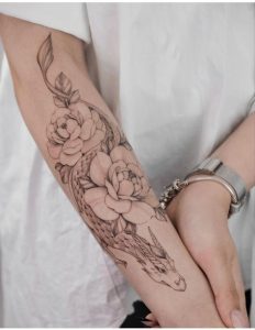 flower-and-snake-half-arm-sleeve-tattoo