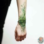 why tattoo turns green