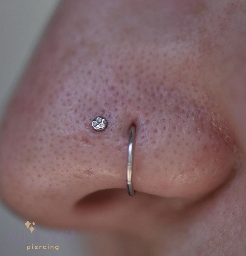 Small heart near a nose stud