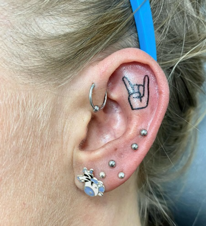 “Yo” Ear Tattoo Piercing