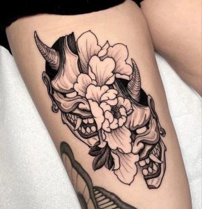 oni mask tattoo with flower