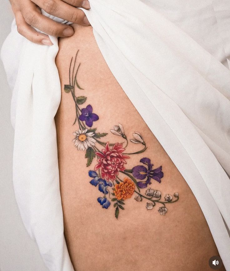 Elegant May Birth Flower Tattoo for the Hip Area Elegant May Birth Flower Tattoo for the Hip Area